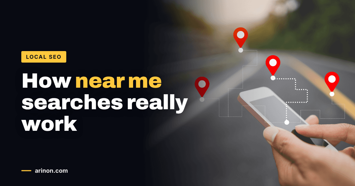 Hands holding a smartphone on a road with red map location pins above it