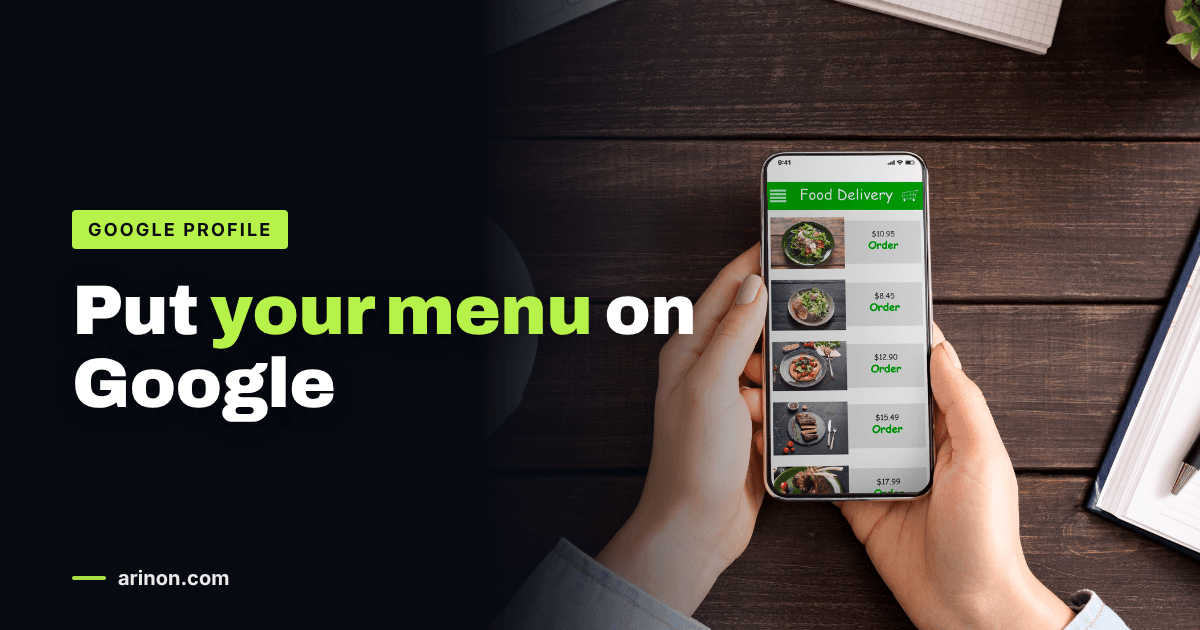 Hands scrolling a food menu with prices on a smartphone above a wooden desk