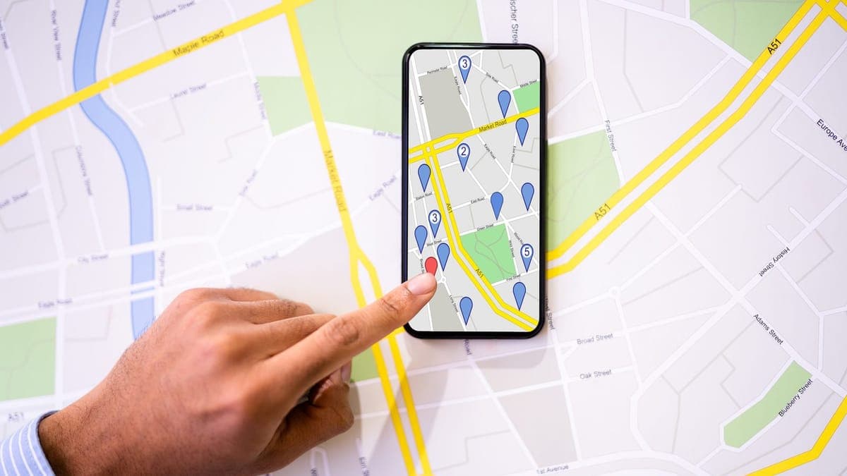Red location pin marker on a city map